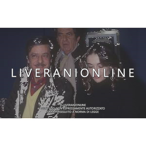 RETROSPETTIVA GIANCARLO GIANNINI ATTORE NELLA FOTO GIANCARLO GIANNINI CON NANNI LOI E LINA SASTRI NELL\'ANNO 1984 IN TERRAZZA MARTINI A MILANO AG ALDO LIVERANI SAS  