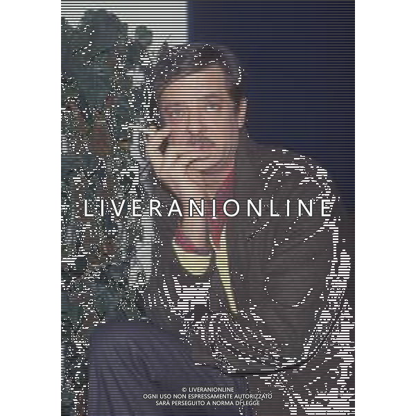 RETROSPETTIVA GIANCARLO GIANNINI ATTORE NELLA FOTO GIANCARLO GIANNINI NELL\'ANNO 1984 IN TERRAZZA MARTINI A MILANO AG ALDO LIVERANI SAS  