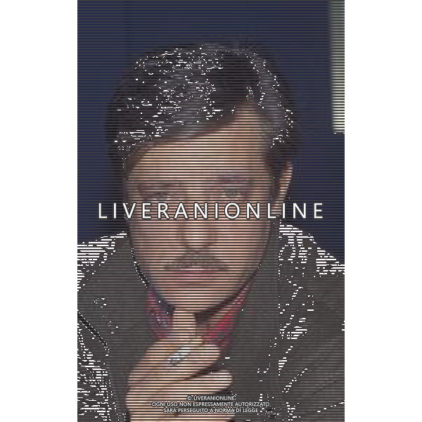 RETROSPETTIVA GIANCARLO GIANNINI ATTORE NELLA FOTO GIANCARLO GIANNINI NELL\'ANNO 1984 IN TERRAZZA MARTINI A MILANO AG ALDO LIVERANI SAS  