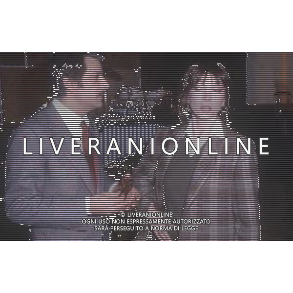 RETROSPETTIVA GIANCARLO GIANNINI ATTORE NELLA FOTO GIANCARLO GIANNINI CON MARIANGELA MELATO NELL\'ANNO 1982 A MILANO TERRAZZA MARTINI AG ALDO LIVERANI SAS