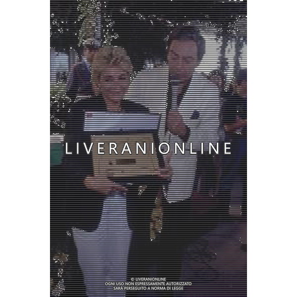 DONATELLA RAFFAI GIORNALISTA E CONDUTTRICE TELEVISIVA NELLA FOTO CON DANIELE PIOMBI AL PREMIO REGIA TELEVISIVA OSCAR TV NEL 1990 ©AGENZIA ALDO LIVERANI SAS