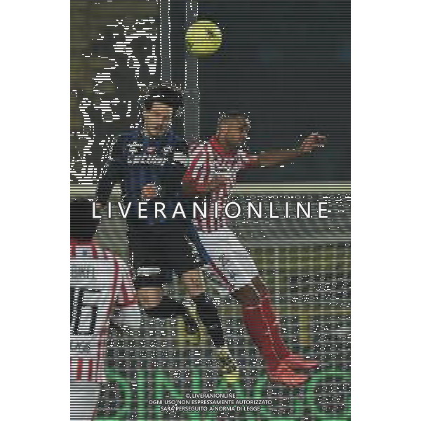 Gabriele Masotti/LMedia - AC Pisa vs LR Vicenza - Italian soccer Serie B match 2021/2022 February 15 2022 - Arena Garibaldi Pisa, Italy AC Pisa vs LR Vicenza Photo showing: Head tackle by Maxime Leverbe (Pisa) and Davide Djily Diaw (Vicenza) @Gabriele Masotti/LiveMedia /AGENZIA ALDO LIVERANI SAS