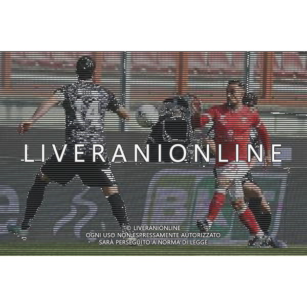 Loris Cerquiglini/LMedia - AC Perugia vs Como 1907 - Italian soccer Serie B match 2021/2022 March 20 2022 - Stadio Renato Curi Perugia, Italy AC Perugia vs Como 1907 Photo showing: marcello falzerano (n.23 perugia calcio)&#xA; v bellemo alessandro (n.14 como 1907) @Loris Cerquiglini/LiveMedia /AGENZIA ALDO LIVERANI SAS