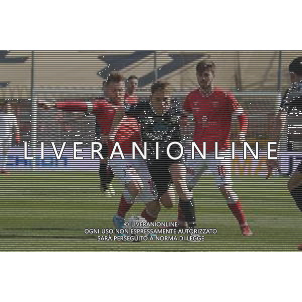 Loris Cerquiglini/LMedia - AC Perugia vs Como 1907 - Italian soccer Serie B match 2021/2022 March 20 2022 - Stadio Renato Curi Perugia, Italy AC Perugia vs Como 1907 Photo showing: nardi filippo (n.25 como 1907) minesso mattia (pg18 perugia calcio)&#xA; ghion andrea (n.16 perugia calcio) @Loris Cerquiglini/LiveMedia /AGENZIA ALDO LIVERANI SAS
