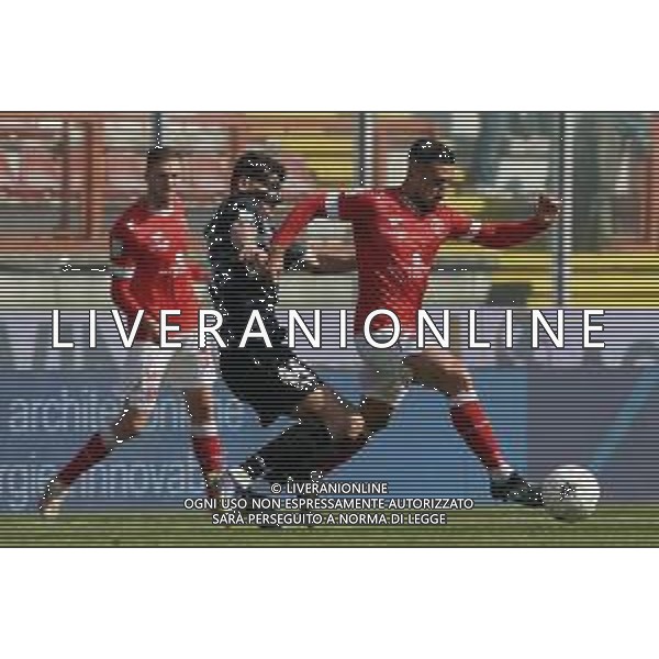 Loris Cerquiglini/LMedia - AC Perugia vs Como 1907 - Italian soccer Serie B match 2021/2022 March 20 2022 - Stadio Renato Curi Perugia, Italy AC Perugia vs Como 1907 Photo showing: marcello falzerano (n.23 perugia calcio)&#xA; v ioannou nikolas (n.44 como 1907) @Loris Cerquiglini/LiveMedia /AGENZIA ALDO LIVERANI SAS