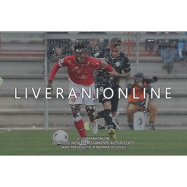 Loris Cerquiglini/LMedia - AC Perugia vs Como 1907 - Italian soccer Serie B match 2021/2022 March 20 2022 - Stadio Renato Curi Perugia, Italy AC Perugia vs Como 1907 Photo showing: gyabuaa manu emmanuel (n.4 perugia calcio) vv blanco alex (n.19 como 1907) @Loris Cerquiglini/LiveMedia AG ALDO LIVERANI SAS