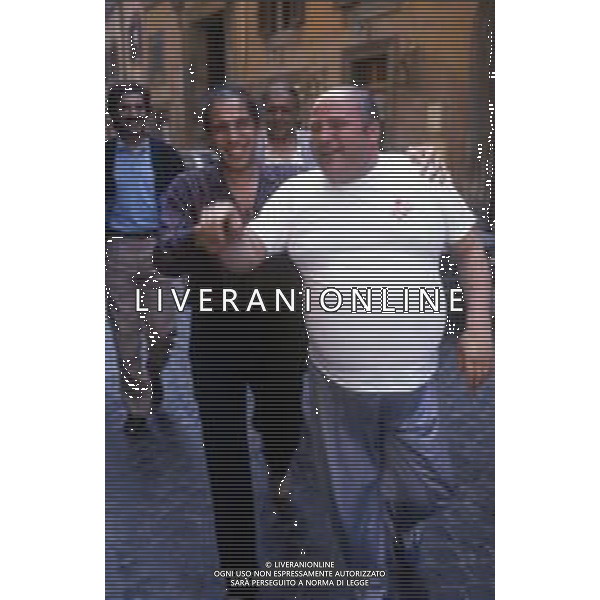RETROSPETTIVA ADRIANO CELENTANO ATTORE CANTANTE  NELLA FOTO ADRIANO CELENTANO NELL\'ANNO 1985 SUL SET DEL FILM“ JOAN LUI“ A ROMA AG ALDO LIVERANI SAS 