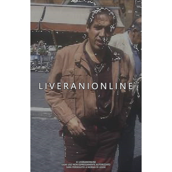 RETROSPETTIVA ADRIANO CELENTANO ATTORE CANTANTE  NELLA FOTO ADRIANO CELENTANO NELL\'ANNO 1985 SUL SET DEL FILM“ JOAN LUI“ A ROMA AG ALDO LIVERANI SAS 