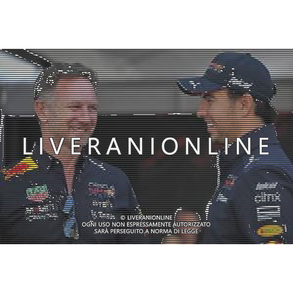 (L to R): Christian Horner (GBR) Red Bull Racing Team Principal with Sergio Perez (MEX) Red Bull Racing. 08.04.2022. Formula 1 World Championship, Rd 3, Australian Grand Prix, Albert Park, Melbourne, Australia, Practice Day. - www.xpbimages.com, EMail: requests@xpbimages.com © Copyright: Coates / XPB Images/AGENZIA ALDO LIVERANI SAS - ITALY ONLY EDITORIAL UESE ONLY