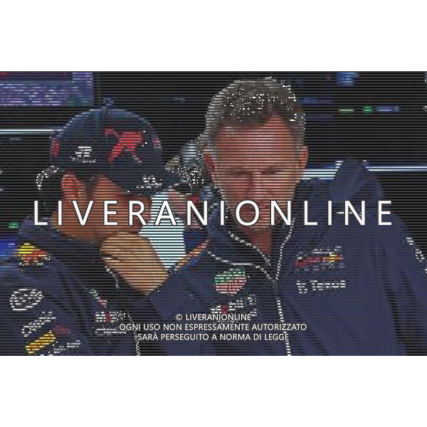 (L to R): Sergio Perez (MEX) Red Bull Racing and Christian Horner (GBR) Red Bull Racing Team Principal. 22.04.2022. Formula 1 World Championship, Rd 4, Emilia Romagna Grand Prix, Imola, Italy, Qualifying Day. - www.xpbimages.com, EMail: requests@xpbimages.com © Copyright: Batchelor / XPB Images/AGENZIA ALDO LIVERANI SAS - ITALY ONLY EDITORIAL USE ONLY