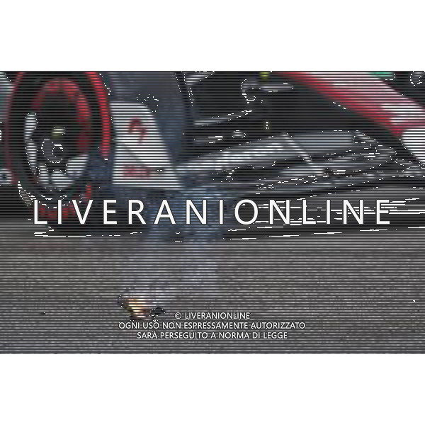 An Alfa Romeo F1 Team C42 passes some smoking debris from the Williams Racing FW44 of Alexander Albon (THA). 22.04.2022. Formula 1 World Championship, Rd 4, Emilia Romagna Grand Prix, Imola, Italy, Qualifying Day. - www.xpbimages.com, EMail: requests@xpbimages.com © Copyright: Coates / XPB Images/AGENZIA ALDO LIVERANI SAS - ITALY ONLY EDITORIAL USE ONLY