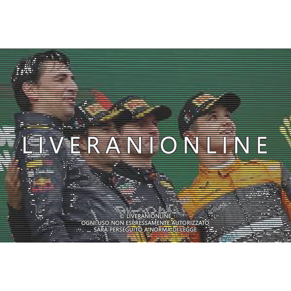 Sergio Perez (MEX), Red Bull Racing Lando Norris (GBR), McLaren F1 Team and Max Verstappen (NLD), Red Bull Racing 24.04.2022. Formula 1 World Championship, Rd 4, Emilia Romagna Grand Prix, Imola, Italy, Race Day. - www.xpbimages.com, EMail: requests@xpbimages.com ¬© Copyright: Charniaux / XPB Images/ AGENZIA ALDO LIVERANI SAS - ITALY ONLY EDITORIAL USE ONLY