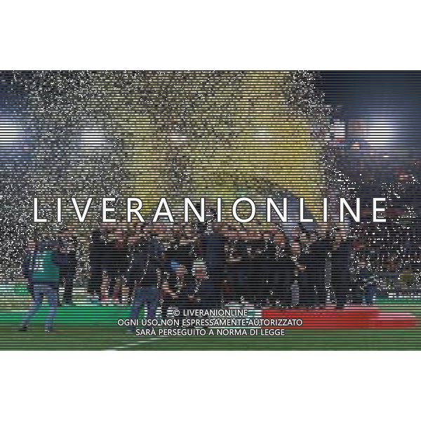 Emmanuele Mastrodonato/LMedia - US Lecce vs Pordenone Calcio - Italian soccer Serie B match 2021/2022 May 06 2022 - Stadio Via del Mare Lecce, Italy US Lecce vs Pordenone Calcio Photo showing: Captain Fabio Lucioni (US Lecce) raises the cup to the sky for the victory of the Serie B 2021/2022 championship @Emmanuele Mastrodonato/LiveMedia AG ALDO LIVERANI SAS