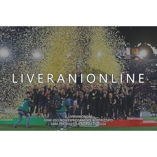 Emmanuele Mastrodonato/LMedia - US Lecce vs Pordenone Calcio - Italian soccer Serie B match 2021/2022 May 06 2022 - Stadio Via del Mare Lecce, Italy US Lecce vs Pordenone Calcio Photo showing: Captain Fabio Lucioni (US Lecce) raises the cup to the sky for the victory of the Serie B 2021/2022 championship @Emmanuele Mastrodonato/LiveMedia AG ALDO LIVERANI SAS