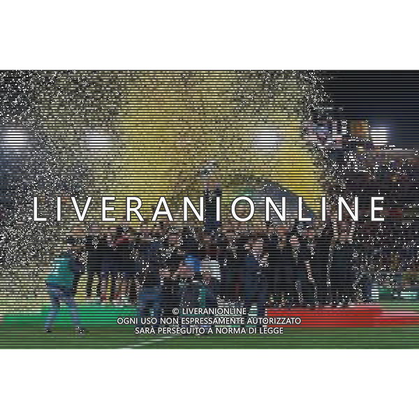 Emmanuele Mastrodonato/LMedia - US Lecce vs Pordenone Calcio - Italian soccer Serie B match 2021/2022 May 06 2022 - Stadio Via del Mare Lecce, Italy US Lecce vs Pordenone Calcio Photo showing: Captain Fabio Lucioni (US Lecce) raises the cup to the sky for the victory of the Serie B 2021/2022 championship @Emmanuele Mastrodonato/LiveMedia AG ALDO LIVERANI SAS