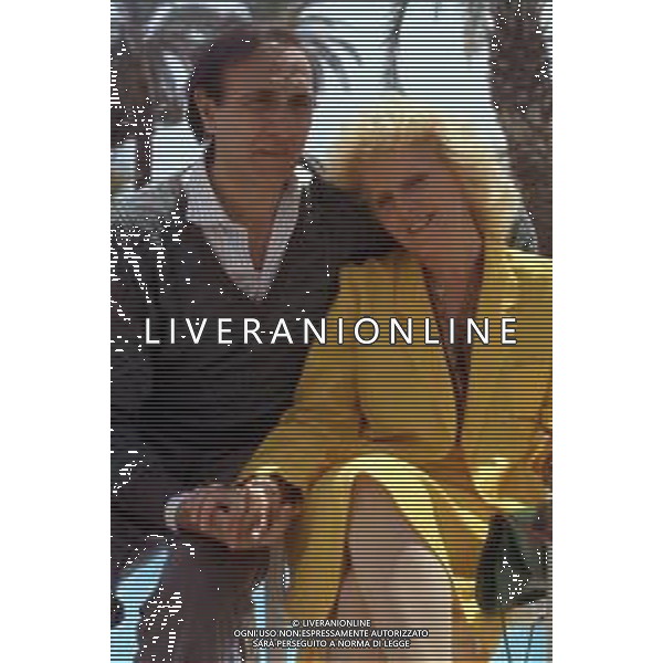 RETROSPETTIVA PIPPO BAUDO PRESENTATORE TELEVISIVO NELLA FOTO CON LA MOGLIE KATIA RICCIARELLI A CANNES NELL\'ANNO 1986 ©ARCHIVIO/AGENZIA ALDO LIVERANI SAS