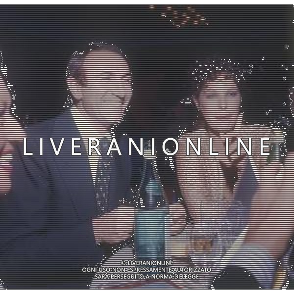 RETROSPETTIVA PIPPO BAUDO PRESENTATORE TELEVISIVO NELLA FOTO PIPPO BAUDO CON MARIA GRAZIA GRASSINI A CAMPIONE D\'ITALIA NELL\'ANNO 1975 AG ALDO LIVERANI SAS