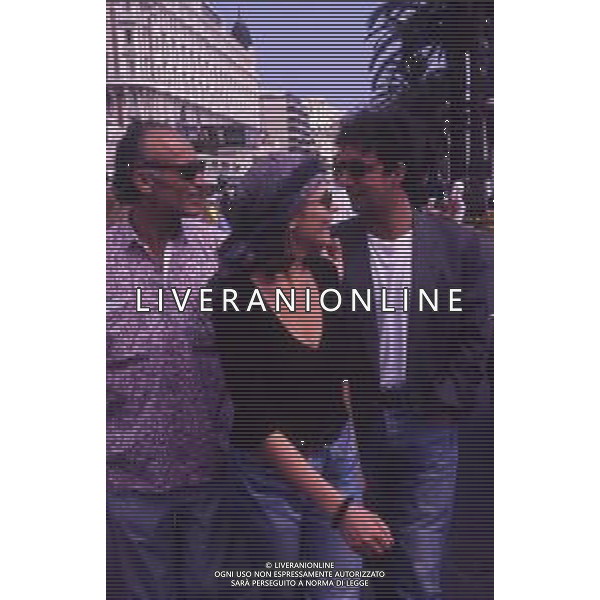 RETROSPETTIVA ISABELLA FERRARI ATTRICE NELLA FOTO ISABELLA FERRARI NELL\'ANNO 1989 AL FESTIVAL DI CANNES CON FRANCESCO NUTI AG ALDO LIVERANI SAS 