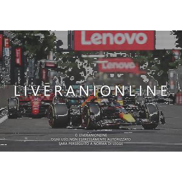 Sergio Perez (MEX) Red Bull Racing RB18 leads at the start of the race. 12.06.2022. Formula 1 World Championship, Rd 8, Azerbaijan Grand Prix, Baku Street Circuit, Azerbaijan, Race Day. - www.xpbimages.com, EMail: requests@xpbimages.com © Copyright: Charniaux / XPB Images/AGENZIA ALDO LIVERANI SAS - ITALY ONLY EDITORIAL USE ONLY