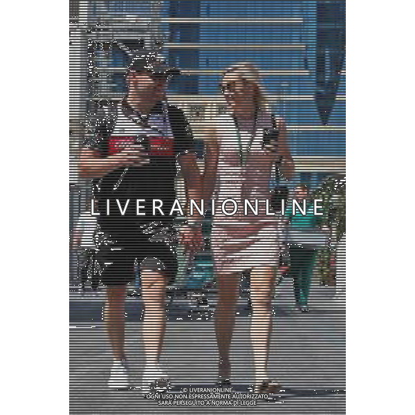 (L to R): Valtteri Bottas (FIN) Alfa Romeo F1 Team with his girlfriend Tiffany Cromwell (AUS) Professional Cyclist. 12.06.2022. Formula 1 World Championship, Rd 8, Azerbaijan Grand Prix, Baku Street Circuit, Azerbaijan, Race Day. - www.xpbimages.com, EMail: requests@xpbimages.com © Copyright: Coates / XPB Images/AGENZIA ALDO LIVERANI SAS - ITALY ONLY EDITORIAL USE ONLY