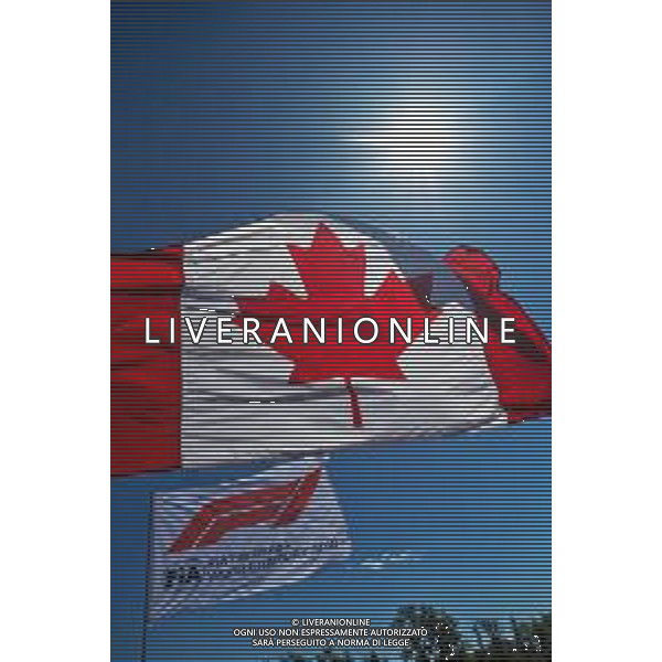 Circuit atmosphere - Canadian and F1 flags. 19.06.2022. Formula 1 World Championship, Rd 9, Canadian Grand Prix, Montreal, Canada, Race Day. - www.xpbimages.com, EMail: requests@xpbimages.com © Copyright: Price / XPB Images/AGENZIA ALDO LIVERANI SAS - ITALY ONLY EDITORIAL USE ONLY
