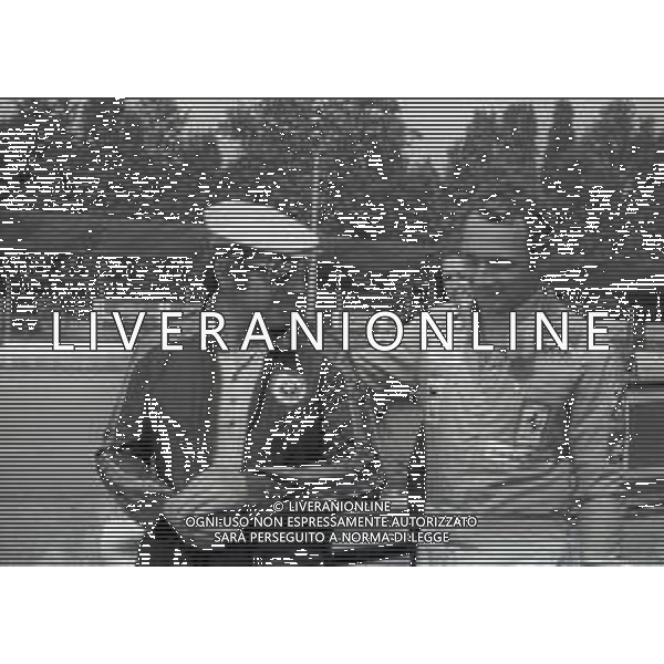 RETROSPETTIVA NIKI LAUDA PILOTA F1 NELLA FOTO NIKI LAUDA NELL\'ANNO 1975 A MONZA CON VITTORIO BRAMBILLA AG ALDO LIVERANI SAS