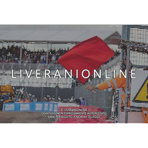 Circuit atmosphere - Marshal waves a red flag. 01.07.2022. Formula 1 World Championship, Rd 10, British Grand Prix, Silverstone, England, Practice Day. - www.xpbimages.com, EMail: requests@xpbimages.com © Copyright: Bearne / XPB Images/AGENZIA ALDO LIVERANI SAS - ITALY ONLY EDITORIAL USE ONLY