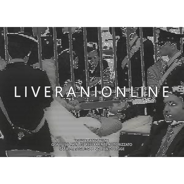 RETROSPETTIVA CORRADO ALUNNI TERRORISTA E AFFILIATO ALLE BRIGATE ROSSE NELLA FOTO CORRADO ALUNNI NELL\'ANNO 1980 IN TRIBUNALE A MILANO FERITO DOPO L\'EVASIONE DAL CARCERE DI SAN VITTORE AG ALDO LIVERANI SAS 