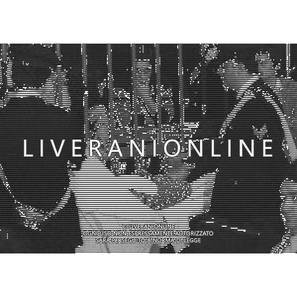 RETROSPETTIVA CORRADO ALUNNI TERRORISTA E AFFILIATO ALLE BRIGATE ROSSE NELLA FOTO CORRADO ALUNNI NELL\'ANNO 1980 IN TRIBUNALE A MILANO FERITO DOPO L\'EVASIONE DAL CARCERE DI SAN VITTORE AG ALDO LIVERANI SAS 