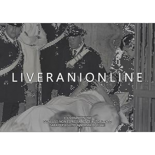 RETROSPETTIVA CORRADO ALUNNI TERRORISTA E AFFILIATO ALLE BRIGATE ROSSE NELLA FOTO CORRADO ALUNNI NELL\'ANNO 1980 IN TRIBUNALE A MILANO FERITO DOPO L\'EVASIONE DAL CARCERE DI SAN VITTORE AG ALDO LIVERANI SAS 