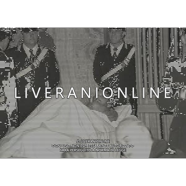 RETROSPETTIVA CORRADO ALUNNI TERRORISTA E AFFILIATO ALLE BRIGATE ROSSE NELLA FOTO CORRADO ALUNNI NELL\'ANNO 1980 IN TRIBUNALE A MILANO FERITO DOPO L\'EVASIONE DAL CARCERE DI SAN VITTORE AG ALDO LIVERANI SAS 