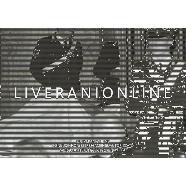 RETROSPETTIVA CORRADO ALUNNI TERRORISTA E AFFILIATO ALLE BRIGATE ROSSE NELLA FOTO CORRADO ALUNNI NELL\'ANNO 1980 IN TRIBUNALE A MILANO FERITO DOPO L\'EVASIONE DAL CARCERE DI SAN VITTORE AG ALDO LIVERANI SAS 