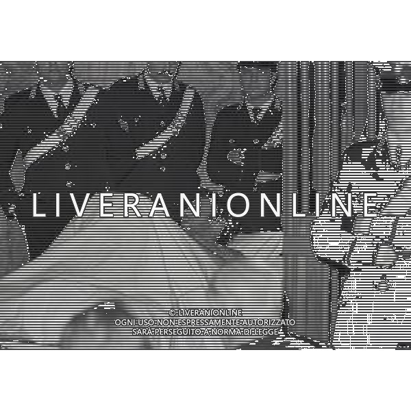 RETROSPETTIVA CORRADO ALUNNI TERRORISTA E AFFILIATO ALLE BRIGATE ROSSE NELLA FOTO CORRADO ALUNNI NELL\'ANNO 1980 IN TRIBUNALE A MILANO FERITO DOPO L\'EVASIONE DAL CARCERE DI SAN VITTORE AG ALDO LIVERANI SAS 