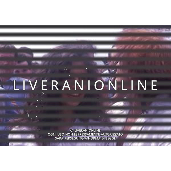 RETROSPETTIVA KLAUS KINSKI ATTORE NELLA FOTO KLAUS KINSKI A CANNES NELL\'ANNO 1988 CON DEBORA CAPRIOGLIO AG ALDO LIVERANI SAS 
