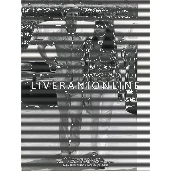 RETROSPETTIVA KLAUS KINSKI ATTORE NELLA FOTO KLAUS KINSKI CON LA MOGLIE MINHOI LOANIC A CANNES AG ALDO LIVERANI SAS