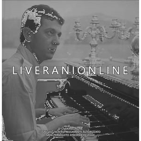 RETROSPETTIVA EMIDIO REMIGI DETTO MEMO, CANTANTE NELLA FOTO NELLA SUA CASA SUL LAGO DI COMO NEL 1966  ©Archivio Giovanni Liverani/AG ALDO LIVERANI SAS  