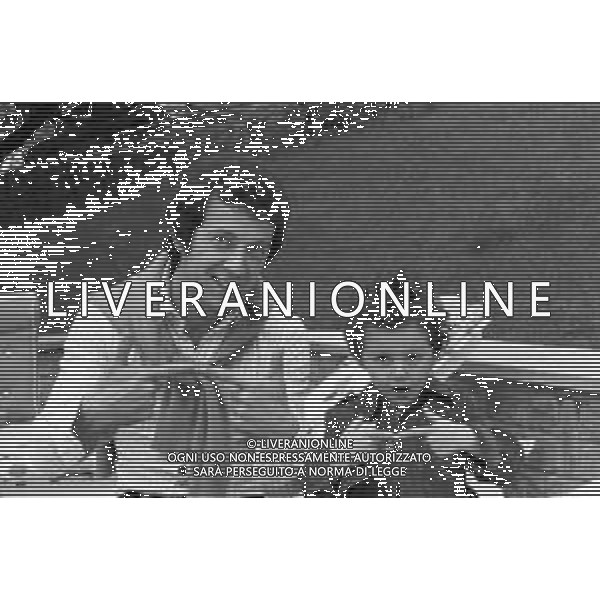 RETROSPETTIVA EMIDIO REMIGI DETTO MEMO, CANTANTE NELLA FOTO A SAINT VINCENT CON IL FIGLIO STEFANO NEL 1971  ©Archivio Giovanni Liverani/AG ALDO LIVERANI SAS  