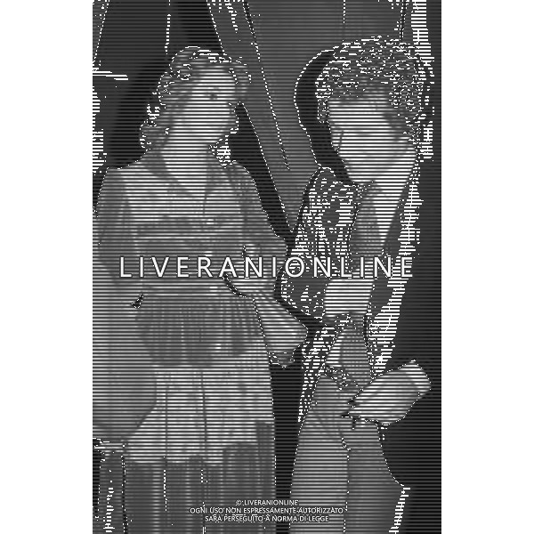 RETROSPETTIVA EMIDIO REMIGI DETTO MEMO, CANTANTE NELLA FOTO CON PAOLA TEDESCO A MILANO NEL 1975  ©Archivio Giovanni Liverani/AG ALDO LIVERANI SAS  