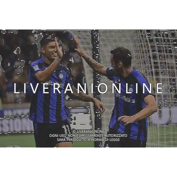 Joaquin Correa (Inter) e Hakan Calhanoglu (Inter) esultano dopo il gol dell\'1 a 0 Inter vs Cremonese Milano 30-08-2022 Stadio Giuseppe Meazza - San Siro Campionato Serie A TIM - 4a giornata foto Roberto Garavaglia/ag. Aldo Liverani sas