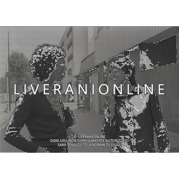 RETROSPETTIVA GIANNI MORANDI CANTANTE NELLA FOTO GIANNI MORANDI CON CHRISTIAN FUORI DALLA SEDE RAI DI MILANO NELL\'ANNO 1975 AG ALDO LIVERANI SAS 