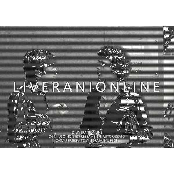 RETROSPETTIVA GIANNI MORANDI CANTANTE NELLA FOTO GIANNI MORANDI CON CHRISTIAN FUORI DALLA SEDE RAI DI MILANO NELL\'ANNO 1975 AG ALDO LIVERANI SAS 