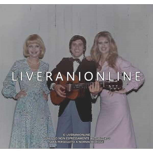 ARCHIVIO GIOVANNI LIVERANI NELLA FOTO GIANNI MORANDI CON ANNAMARIA RIZZOLI AGENZIA ALDO LIVERANI