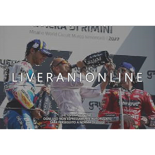 MOTOMONDIALE 2022 - GRAN PREMIO GRYFYN DI SAN MARINO E DELLA RIVIERA DI RIMINI 04/09/2022 nella foto: domenicali festeggia sul podio con Enea Bastianini of Italy and Gresini Racing MotoGP Francesco Bagnaia of Italy and Ducati Lenovo Team ©Claudio Zamagni/Agenzia Aldo Liverani /AGENZIA ALDO LIVERANI SAS