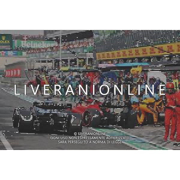 Carlos Sainz Jr (ESP) Ferrari F1-75 leaves the pits in the path of Fernando Alonso (ESP) Alpine F1 Team A522. 04.09.2022. Formula 1 World Championship, Rd 14, Dutch Grand Prix, Zandvoort, Netherlands, Race Day. - www.xpbimages.com, EMail: requests@xpbimages.com © Copyright: Moy / XPB Images/AGENZIA ALDO LIVERANI SAS - ITALY ONLY EDITORIAL USE ONLY
