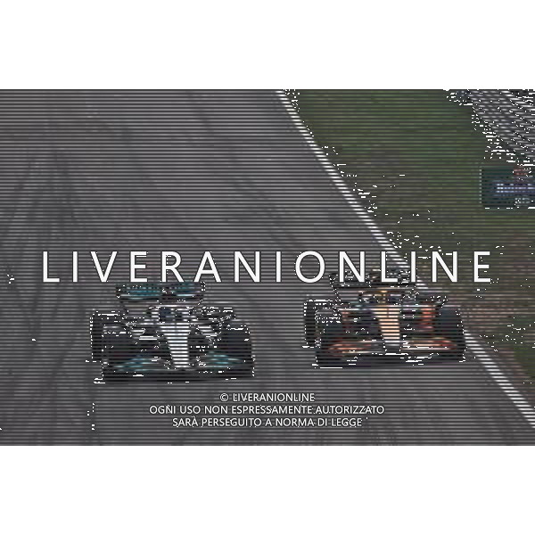 George Russell (GBR) Mercedes AMG F1 W13 and Lando Norris (GBR) McLaren MCL36 battle for position. 04.09.2022. Formula 1 World Championship, Rd 14, Dutch Grand Prix, Zandvoort, Netherlands, Race Day. - www.xpbimages.com, EMail: requests@xpbimages.com © Copyright: Bearne / XPB Images/AGENZIA ALDO LIVERANI SAS - ITALY ONLY EDITORIAL USE ONLY