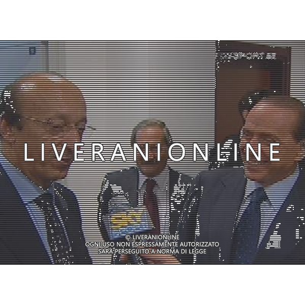 MILAN-JUVENTUS SERIE A TIM 29/10/2005 NELLA FOTO SILVIO BERLUSCONI CON LUCIANO MOGGI NEGLI SPOGLIATOI A FINE GARA OBBLIGATORIO CITARE LA FONTE TELEVISIVA AGENZIA ALDO LIVERANI