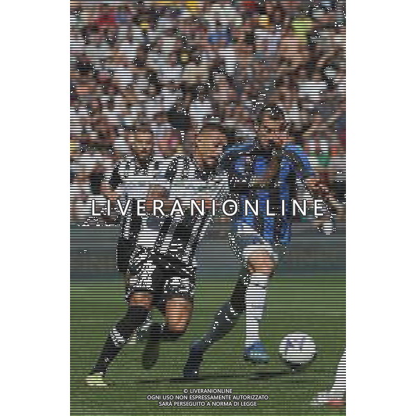 UDINE 18-09-22 FOT AG. ALDO LIVERANI / GARBUIO UDINESE VS INTER NELLA FOTO: PEREYRA ROBERTO MAXIMILIANO E MKHITARYAN HENRIKH UDINESE - INTER CAMPIONATO CALCIO SERIE A TIM 18.09.2022 ©P.G.AGENZIA ALDO LIVERANI SAS