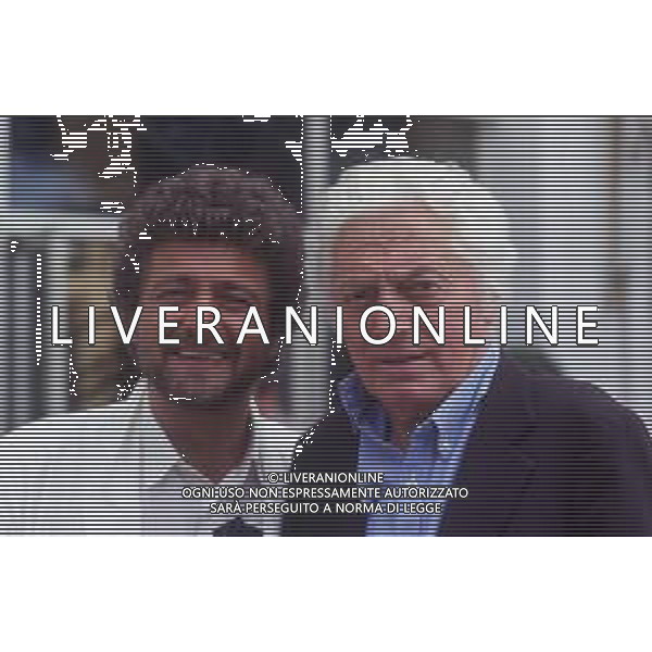 RETROSPETTIVA DINO RISI REGISTA NELLA FOTO DINO RISI A CANNES NELL\'ANNO 1985 CON BEPPE GRILLO AG ALDO LIVERANI SAS