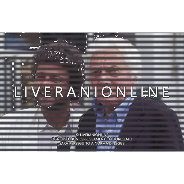 RETROSPETTIVA DINO RISI REGISTA NELLA FOTO DINO RISI A CANNES NELL\'ANNO 1985 CON BEPPE GRILLO AG ALDO LIVERANI SAS