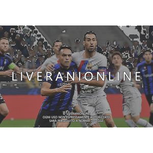 Lautaro Martinez (Inter) e Sergio Busquets (Barcellona) Inter vs Barcellona Milano 04-10-2022 Stadio Giuseppe Meazza - San Siro UEFA Champions League fase a gironi gruppo C - 3a giornata foto Roberto Garavaglia/ag. Aldo Liverani sas /AGENZIA ALDO LIVERANI SAS